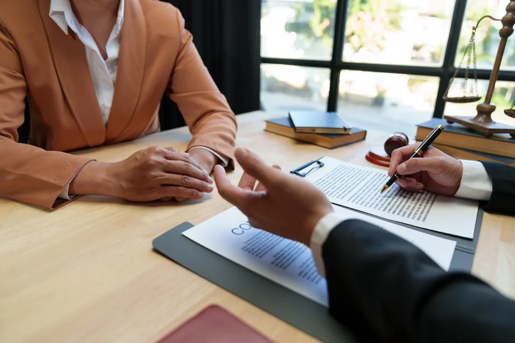 Client meeting with bankruptcy lawyer discussing Chapter 7 bankruptcy and debt relief at Jennings & Messer law firm