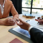 Client meeting with bankruptcy lawyer discussing Chapter 7 bankruptcy and debt relief at Jennings & Messer law firm