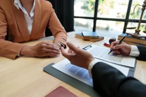 Client meeting with bankruptcy lawyer discussing Chapter 7 bankruptcy and debt relief at Jennings & Messer law firm