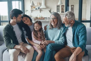 Family gathered at home representing protection of household assets in Chapter 7 bankruptcy